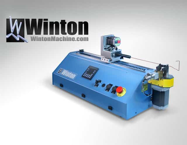 A benchtop mounted CNC coax cable bender made by Winton Machine USA